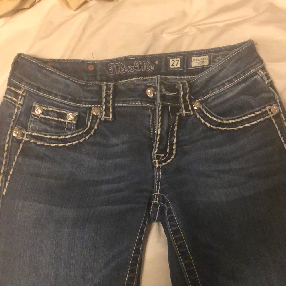 Boot cut white stitch miss me jeans
